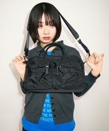 UNDERSTATEMENTs（アンダーステイトメント）の「2WAYナイロンダブルポケットボストンバッグ/ロゴプレート付き（ボストンバッグ）」