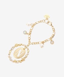 & chouette（アンドシュエット）の「オーバルフラワーイニシャルバッグチャーム(N)（キーホルダー・レディース）」