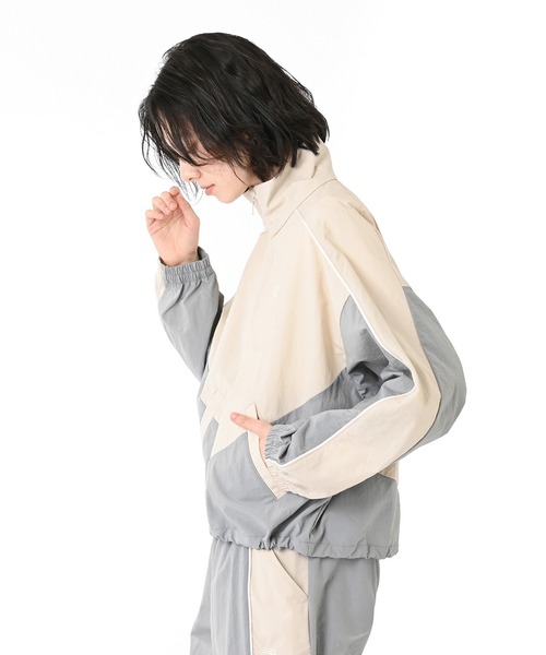 NEW BALANCE(ニューバランス)の「タスランナイロンウーブンジャケット(ブルゾン・レディース・ベージュ/ミント・SMALL/MEDIUM/LARGE/X-LARGE)」の7枚目の写真