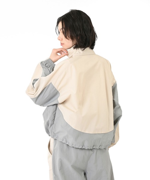 NEW BALANCE(ニューバランス)の「タスランナイロンウーブンジャケット(ブルゾン・レディース・ベージュ/ミント・SMALL/MEDIUM/LARGE/X-LARGE)」の8枚目の写真