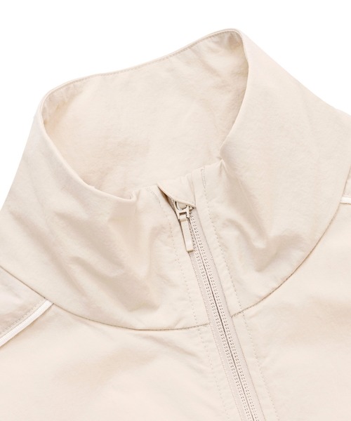 NEW BALANCE(ニューバランス)の「タスランナイロンウーブンジャケット(ブルゾン・レディース・ベージュ/ミント・SMALL/MEDIUM/LARGE/X-LARGE)」の13枚目の写真