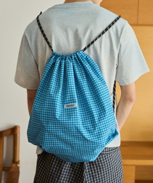 BROKEN BASE(ブロークンベース)の「anorak check knapsack(ショルダーバッグ・メンズ・ホワイト系/ネイビー系/ブルー系・フリー)」の1枚目の写真
