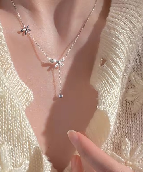 DiamondHearts(ダイヤモンドハーツ)の「リボン&ストーンチャームネックレス(ネックレス・レディース・シルバー/ゴールド系その他・FREE)」の3枚目の写真
