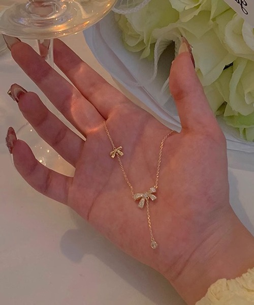 DiamondHearts(ダイヤモンドハーツ)の「リボン&ストーンチャームネックレス(ネックレス・レディース・シルバー/ゴールド系その他・FREE)」の7枚目の写真