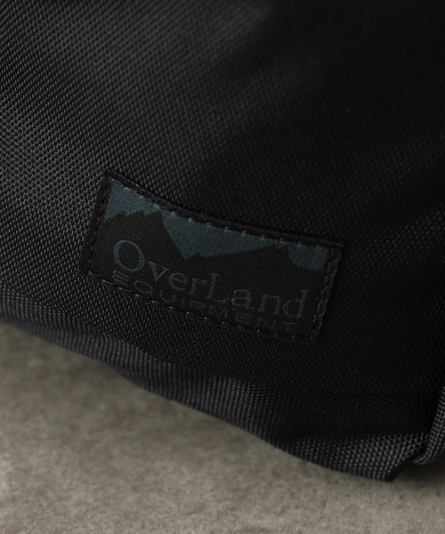 Overland(オーバーランド)の「【OverLand EQUIPMENT/オーバーランドイクイップメント】FLAP BACK PACK / フラップ バック パック(約20L)(バックパック/リュック・メンズ・ブラック・FREE)」の2枚目の写真