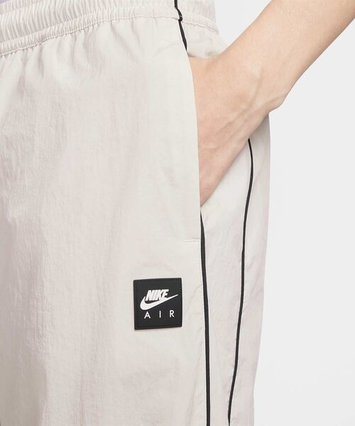 NIKE（ナイキ）の「《セットアップ対応商品》ナイキ エア メンズ トラックパンツ / Nike Air Men's Track Pants IF1307-072 Light Bone（その他パンツ・メンズ・オフホワイト・2XL/XL/S/M/L）」の4枚目の写真