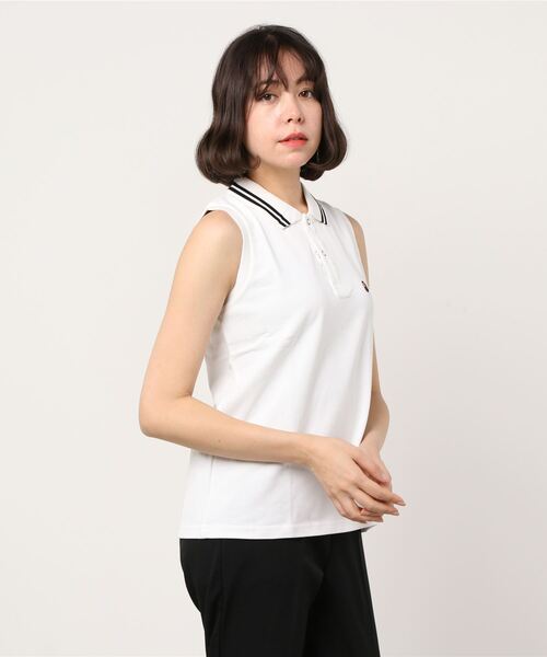 A BATHING APE（アベイシングエイプ）の「APE HEAD ONE POINT SLEEVELESS POLO L（ポロシャツ・レディース・ホワイト/ネイビー・SMALL/X-SMALL）」の2枚目の写真