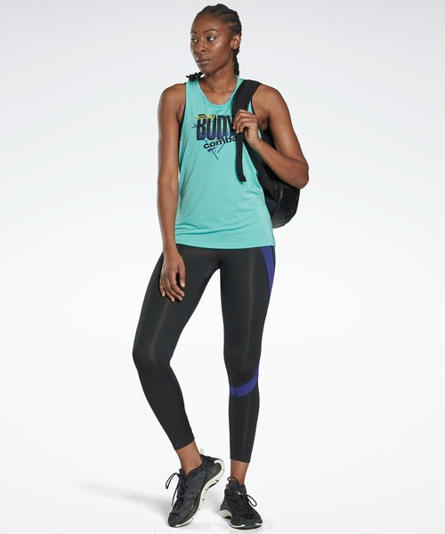 Reebok(リーボック)の「レズミルズR ボディ コンバットR アクティブチル グラフィック タンクトップ / Les MillsR BodyCombatR ACTIVCHILL Graphic Tank Top (タンクトップ・レディース・ブルー・MEDIUM/SMALL/X-SMALL/LARGE/X-LARGE)」の4枚目の写真