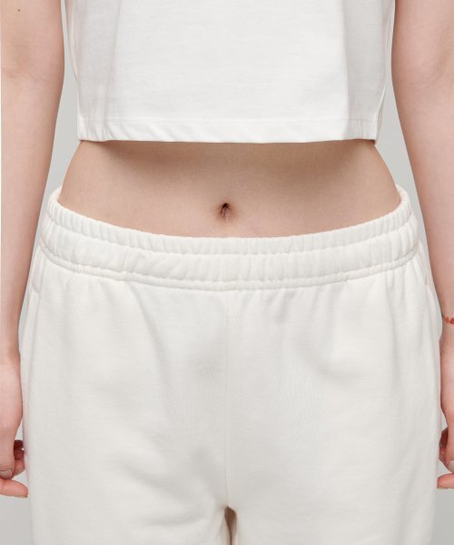 MUSINSA STANDARD WOMAN(ムシンサスタンダードウーマン)の「ウーマンズスウェットパンツ【クリーム】(スウェットパンツ・レディース・その他・SMALL/MEDIUM/LARGE/X-SMALL)」の3枚目の写真