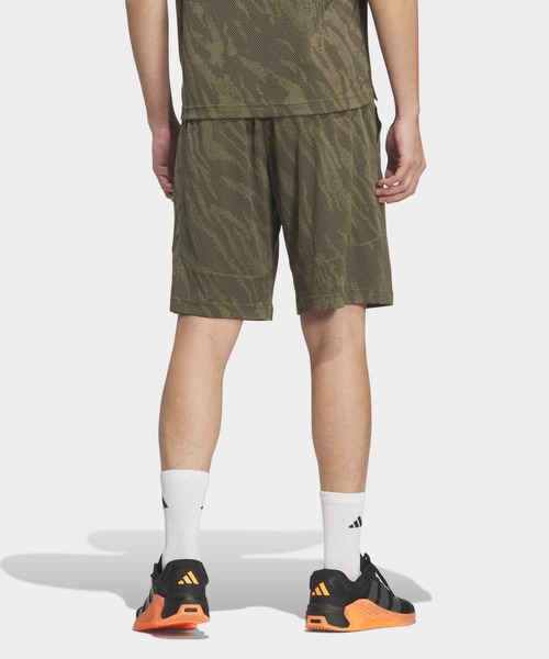 adidas(アディダス)の「テック エッセンシャルズ クール タッチ レギュラーフィット カモ AOP 9インチ ショーツ / ハーフパンツ / アディダス adidas(その他パンツ・メンズ・カーキ・XX-LARGE/3XL/LARGE/MEDIUM/SMALL/X-LARGE/X-SMALL)」の2枚目の写真