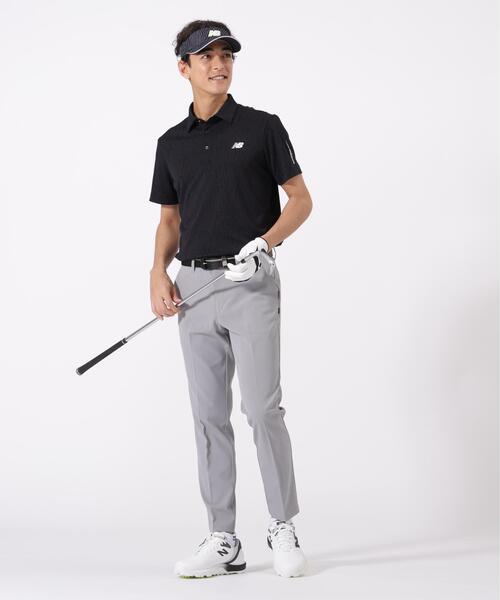 New Balance Golf（ニューバランスゴルフ）の「リフレクト・オーバーラップロゴ 半袖 カラーシャツ (MENS)（ポロシャツ・メンズ・ブラック/ホワイト/パープル・LARGE/MEDIUM/X-LARGE/XX-LARGE）」の5枚目の写真
