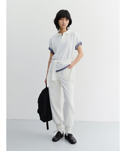 DUNST(ダンスト)の「UNISEX LEATHER LOGO POLO SHIRT_UDTS6B122_OFF WHITE(ポロシャツ・レディース・Off White・LARGE/MEDIUM/SMALL/X-LARGE/X-SMALL)」の2枚目の写真