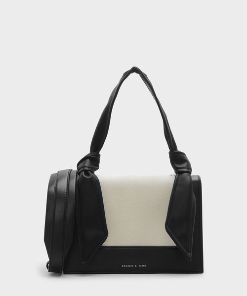 CHARLES & KEITH（チャールズ & キース）の「ノーテッドストラップハンドバッグ / KNOTED STRAP HANDBAG（ハンドバッグ・レディース・レッド/ライトベージュ/ブラック・M）」の3枚目の写真