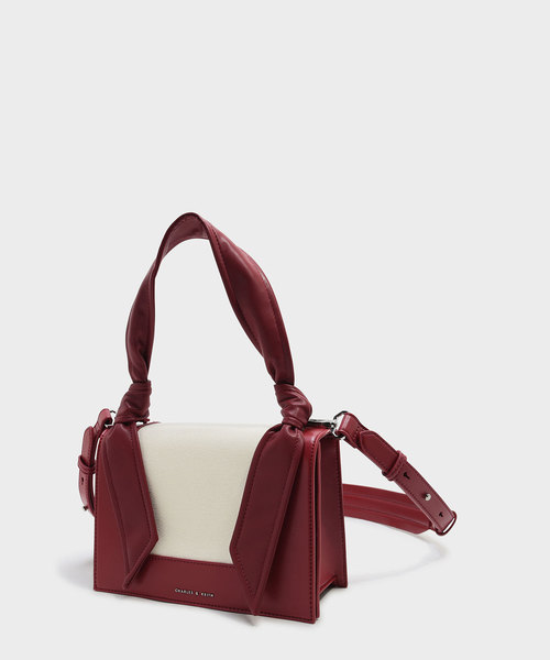 CHARLES & KEITH（チャールズ & キース）の「ノーテッドストラップハンドバッグ / KNOTED STRAP HANDBAG（ハンドバッグ・レディース・レッド/ライトベージュ/ブラック・M）」の9枚目の写真