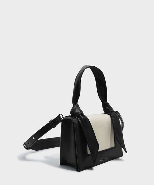 CHARLES & KEITH（チャールズ & キース）の「ノーテッドストラップハンドバッグ / KNOTED STRAP HANDBAG（ハンドバッグ・レディース・レッド/ライトベージュ/ブラック・M）」の14枚目の写真