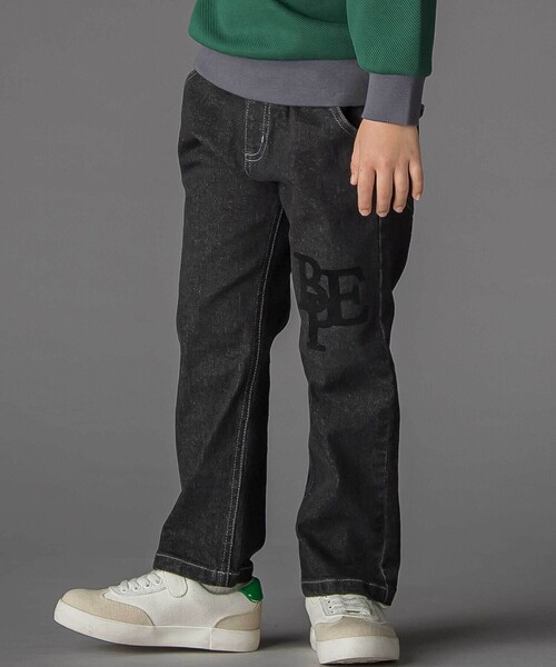 BeBe Petits Pois Vert(ベベプチポワヴェール)の「フロッキープリントストレッチロングデニムパンツ(95~160cm)(デニムパンツ・キッズ・ネイビー/ブラック・100cm/110cm/95cm/130cm/160cm/120cm/150cm/140cm)」の1枚目の写真