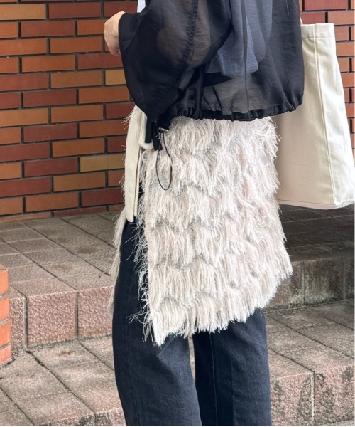 y/m by misato（イムバイミサト）の「フリンジラップスカート（スカート・レディース・アイボリー/ブラック・FREE）」の4枚目の写真