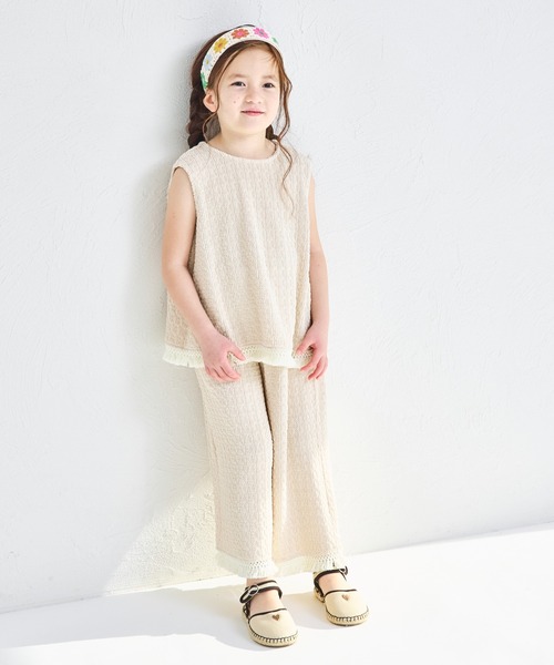 pairmanon（ペアマノン）の「シボ素材 フリンジフリル セットアップ（セットアップ・キッズ・ベージュ/アイボリー/チャコールグレー・90/150/120/110/140/100/130）」の4枚目の写真