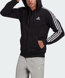 adidas（アディダス）の「エッセンシャルズ フリース スリーストライプス フルジップパーカー / アディダス（パーカー・メンズ）」