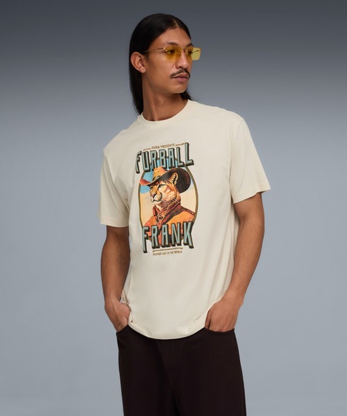 PUMA(プーマ)の「PUMA プーマ メンズ グラフィック キャット カウボーイ リラックスド 半袖 T(Tシャツ/カットソー・メンズ・ブラック/オフホワイト・XX-LARGE/X-LARGE/LARGE/SMALL/MEDIUM)」の1枚目の写真