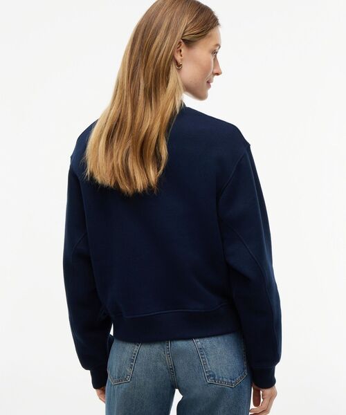 TOMMY HILFIGER（トミーヒルフィガー）の「クルーネックスウェットプルオーバー（スウェット・レディース・ネイビー/ホワイト・SMALL/MEDIUM/X-SMALL）」の5枚目の写真