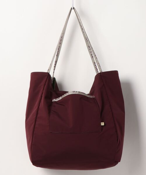 ACCOMMODE（アコモデ）の「バイカラーリバーシブルトートバッグ（トートバッグ・レディース・オレンジ/ライトグリーン/マスタード/アイボリー・FREE）」の5枚目の写真