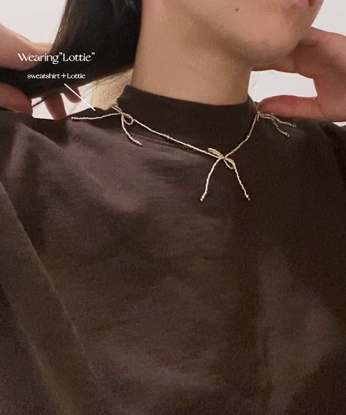 whim(ウィム)の「Lottie-リボンビーズネックレス-(ネックレス・レディース・シルバー/ゴールド/クリア・FREE)」の9枚目の写真