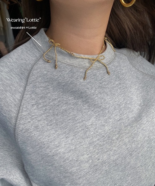 whim(ウィム)の「Lottie-リボンビーズネックレス-(ネックレス・レディース・シルバー/ゴールド/クリア・FREE)」の4枚目の写真