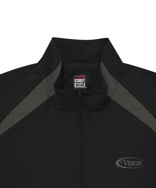 VISION STREET WEAR(ヴィジョンストリートウェア)の「VSW Blocking Wind Jacket Black(ナイロンジャケット・レディース・その他・MEDIUM/LARGE/X-LARGE)」の5枚目の写真