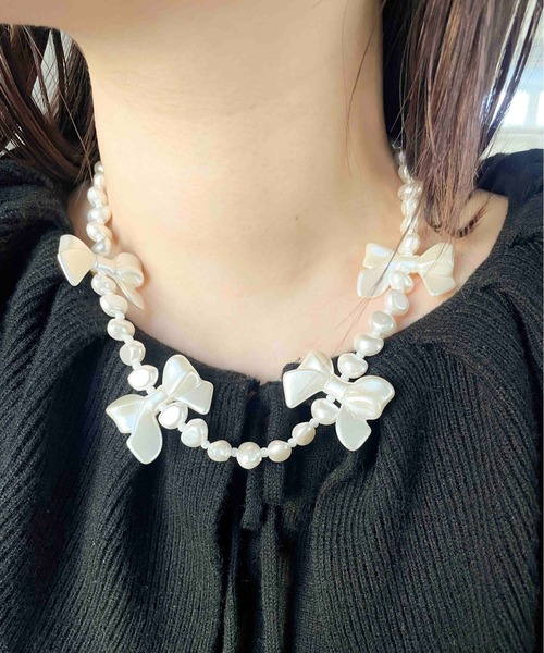 Casselini(キャセリーニ)の「Casselini(キャセリーニ)リボンリボンネックレス(ネックレス・レディース・オフホワイト・FREE)」の6枚目の写真