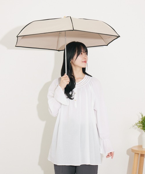 nifty colors（ニフティーカラーズ）の「【niftycolors/ニフティカラーズ】 完全遮光 晴雨兼用パイピングミニ折りたたみ日傘　WEB限定（折りたたみ傘・レディース・ベージュ/ブラック・MEDIUM）」の9枚目の写真
