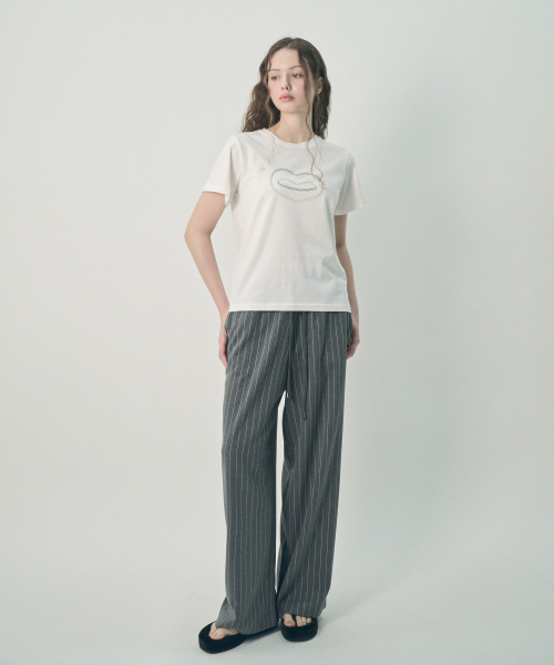 MIHEV(ミヘブ)の「ミヘブ グラフィック シンボル Tシャツ ホワイト(Tシャツ/カットソー・レディース・その他・MEDIUM/LARGE)」の2枚目の写真