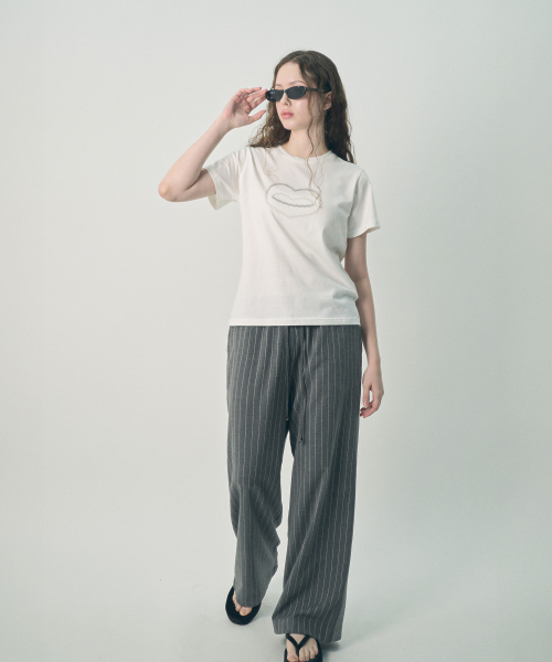 MIHEV(ミヘブ)の「ミヘブ グラフィック シンボル Tシャツ ホワイト(Tシャツ/カットソー・レディース・その他・MEDIUM/LARGE)」の3枚目の写真