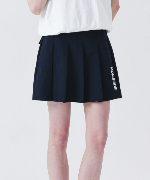 MONBIRDIE GOLF(モンバーディーゴルフ)の「ボールマーカーパッチナイロンプリーツスカートNAVY(スカート・レディース・ネイビー・S/M)」の1枚目の写真