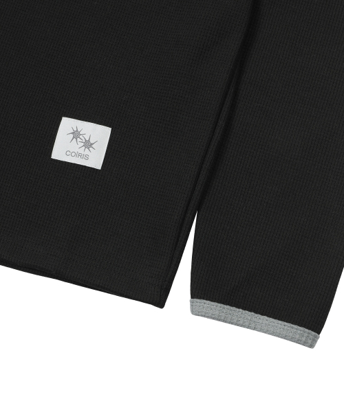 COIRIS(コイリス)の「ステイプルボタンワッフル配色オーバーサイズ長袖Tシャツ男女共用(Tシャツ/カットソー・レディース・ブラック・FREE)」の4枚目の写真