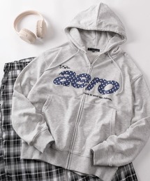 SlashDate（スラッシュデイト）の「【82】 総柄ロゴ ショート丈 裏毛 ジップパーカー/メンズ/レディース/ユニセックス（パーカー）」