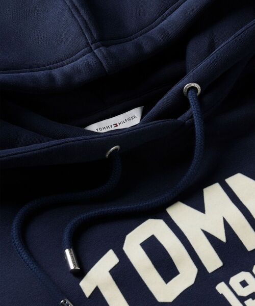 TOMMY HILFIGER(トミーヒルフィガー)の「バーシティフロッキーリラックスパーカー(スウェット・レディース・ネイビー/グレー・X-SMALL/SMALL)」の6枚目の写真