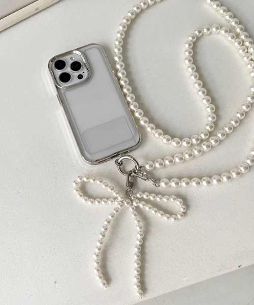 Me%(ミィパーセント)の「リボンチャーム付きボールモバイルストラップ 126830(スマホグッズ・レディース・シルバー/アイボリー・FREE)」の2枚目の写真