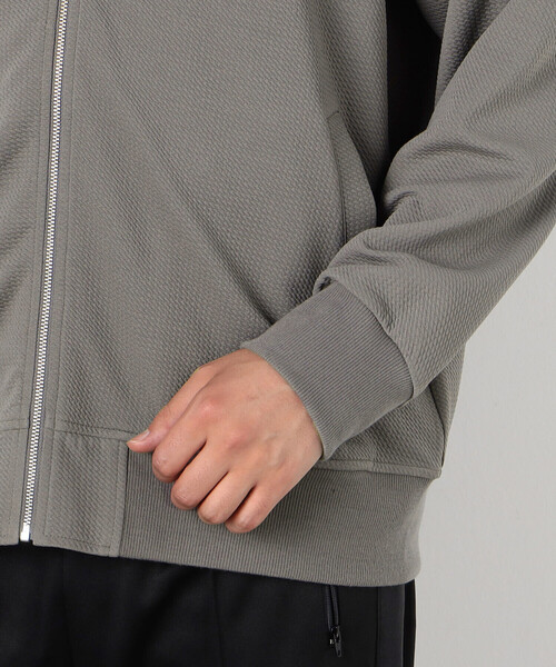 COMME　CA COMMUNE（コムサコミューン）の「フクレジャガード リブブルゾン（ブルゾン・メンズ・ブラック/グレイッシュベージュ・LARGE/MEDIUM）」の11枚目の写真