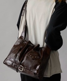 Theater code（シアターコード）の「Studded Faux Leather Drawstring-Style Shoulder Bag / スタッズ付き フェイクレザー 巾着風ショルダーバッグ（ショルダーバッグ・メンズ）」