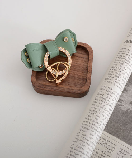 TONE SELECT GOODS（トーンセレクトグッズ）の「【float】リボン ゴールドリング ラインストーン キーリング/キーケース【6色展開】（キーケース/キーアクセサリー・レディース・オフホワイト/ブラック/ブルーグレー/ライトピンク/モスグリーン/レッド・FREE）」の5枚目の写真