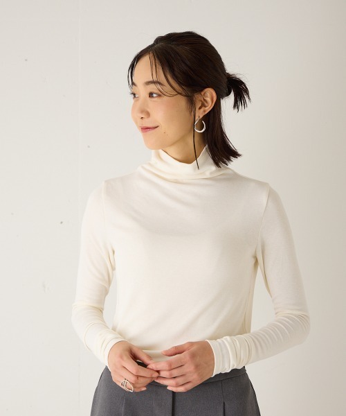 riziere(リジェール)の「MOM:シームレスハイネックプルオーバー(KIDSとお揃い)(Tシャツ/カットソー・レディース・ホワイト/ブラック・FREE)」の1枚目の写真