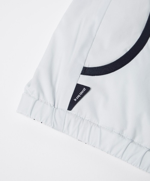 le coq sportif GOLF(ルコックスポルティフゴルフ)の「【le coq sportif GOLF】撥水/ストレッチ/防風/保温リバーシブルフーディージャケット ゴルフウェア(ブルゾン・レディース・ホワイト/パープル・S/M/L/XL)」の4枚目の写真