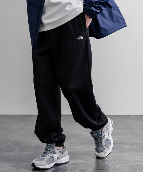 THE NORTH FACE(ザノースフェイス)の「THE NORTH FACE M ESS SD RLX PANTS ノースフェイス 裏起毛ワンポイントロゴ刺繍スウェットワイドイージージョガーパンツ(スウェットパンツ・メンズ・ブラック/ヘザーグレー・S/XL/L/M)」の1枚目の写真