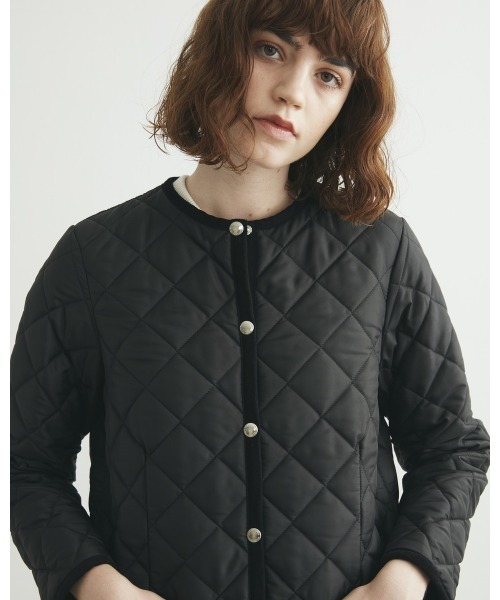 Traditional Weatherwear(トラディショナルウェザーウェア)の「ARKLEY LONG/アークリー ロング キルティング コート(ノーカラーコート・レディース・ネイビー/ブラウン/ブラック×ブラック/テラコッタ・36/34/32)」の6枚目の写真