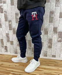 TOMMY HILFIGER(g~[qtBK[)̃GbZVmOXEFbgpc ESSENTIAL MONOGRAM SWEATPANT(XEFbgpc)