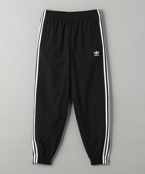 adidas Originals（アディダスオリジナルス）の「＜adidas Originals＞アディカラー ウーブン ファイヤーバード トラックパンツ（スウェットパンツ・メンズ・ブラック/ネイビー・M/XL/L）」の2枚目の写真