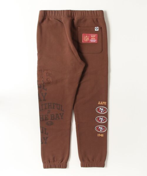 AAPE BY A BATHING APE(エーエイプバイアベイシングエイプ)の「AAPE × NFL Joggers(スウェットパンツ・メンズ・ブラック/ブラウン系その他/ダークグリーン・X-LARGE/SMALL/LARGE/MEDIUM)」の18枚目の写真