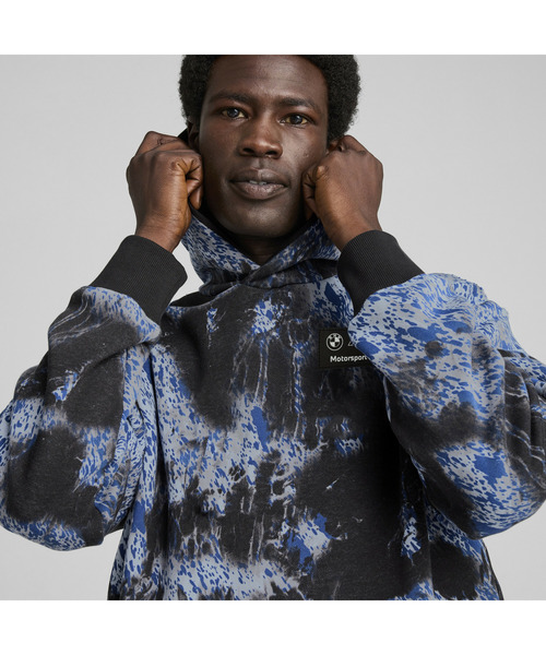 PUMA(プーマ)の「PUMA プーマ メンズ BMW MMS カラースプラッシュ AOP フーディ(パーカー・メンズ・ブラック・MEDIUM/X-LARGE/LARGE/X-SMALL/SMALL)」の2枚目の写真