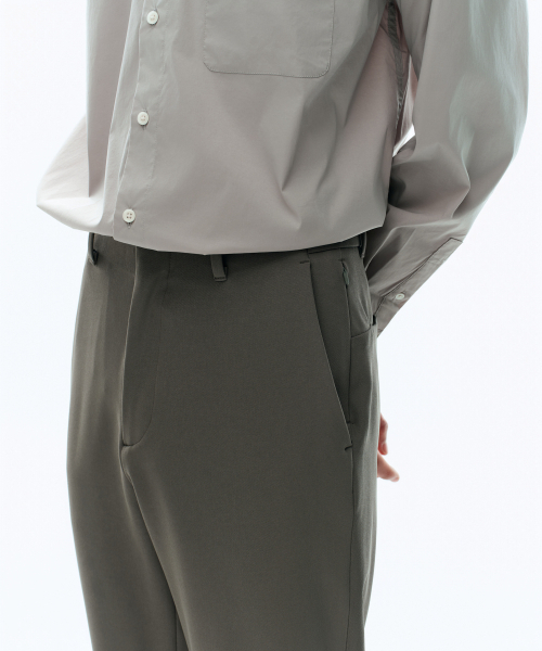 MUSINSA STANDARD（ムシンサスタンダード）の「ハイブリッドストレートパンツ [カーキグレー]（スラックス・メンズ・その他・26/28/30/32/34/36/38/40/42）」の5枚目の写真